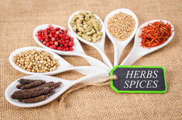 various spices and herbs with herbs spices label