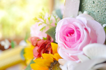 Pink roses with light flare