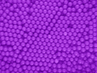 Dragee balls background - violet