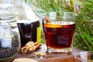 Hot grog with tea, cinnamon and lemon, horizontal