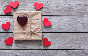 Valentine day background, handmade hearts on wood