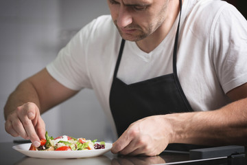 Chef preparing healthy salad
