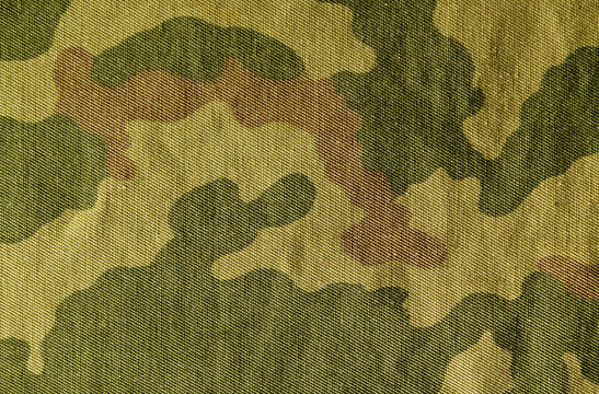 Color camouflage cloth surface.