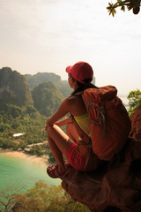 successful woman hiker enjoy the view on mountain top