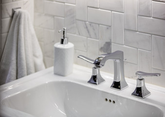 Cropped view of water sink in bathroom