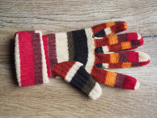 Glove on wood background