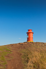 Red Lighthouse on a hill, Iceland