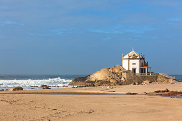 White stone chapel on a Portugal coast