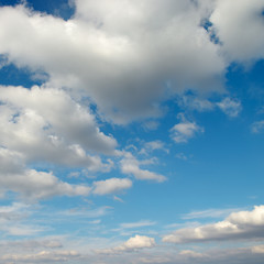 Cirrus clouds in blue sky.