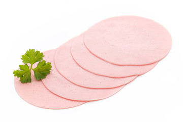 Sliced boiled ham sausage isolated on white background, top view