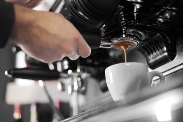 Espresso machine making coffee