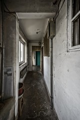 Abandoned grungy corridor in building