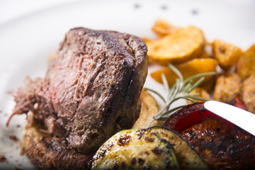 Lambchop meal with potato. Business lunch at the restaurant.