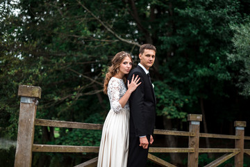 happy bride and groom at a park on their wedding day