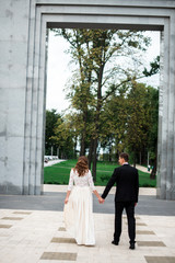 happy bride and groom at a park on their wedding day