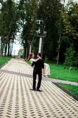 happy bride and groom at a park on their wedding day