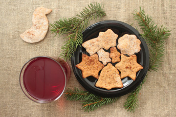 Christmas cookies and drink on a linen background