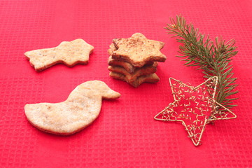 Christmas cookies and decorations on red background