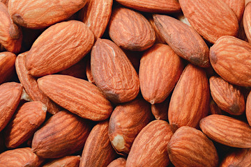 Peeled almonds closeup. For vegetarians
