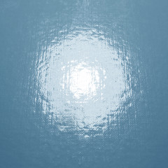 blue shiny winter background with spotlight