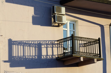 balcony on the wall of the building.