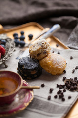 Mix flavour of scone biscuit decorate with chocolate ship and fresh strawberry and blueberry