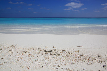 Blue sky, clear water and white sand of tropical paradise, Maldives