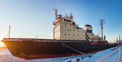 Icebreaker in the river ice. Winter shot. Close up.