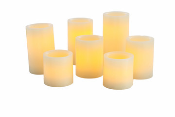 Relaxing aromatic candles for spa on white background