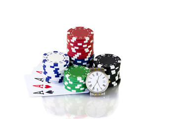 Cards to poker with colorful chips and wrist watches