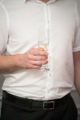 Man holding glass champagne or sparkling wine