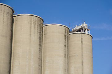 Exterior view of a cement factory, Silos for storage