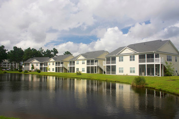 Southern residential neighborhood for vacation rental. Modern neighborhood with buildings around the pond in South Carolina, USA. 