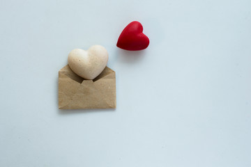 Hearts lies near an envelope