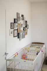 bedroom with photos in various photo frame