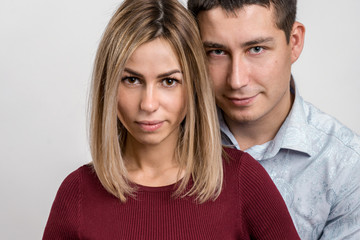 Obraz premium Man and woman. Portrait of a beautiful heterosexual couple. Face closeup