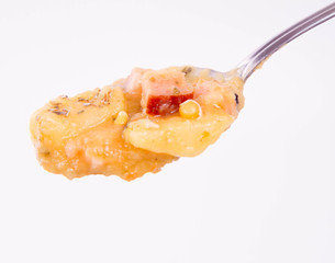 Split pea soup on a spoon