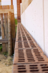 Facing the unfinished brick walls. construction work