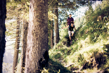 Hiking Seniors in Forest