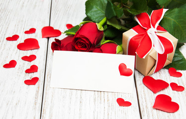 Red roses and greeting card
