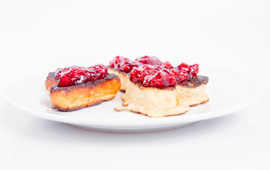 Heart shaped pancakes with cowberry jam