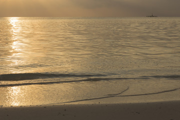 Fototapeta premium Golden sunset in the Indian Ocean.