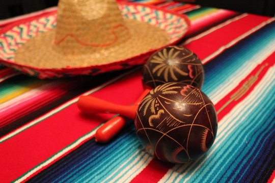 Mexican Mexico blanket poncho maracas cinco de mayo sombrero maracas background fiesta stock, photo, photograph, image, picture