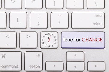 Time for change written on computer keyboard.