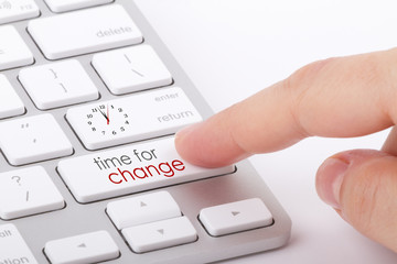 Time for change written on computer keyboard.