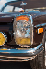 Retro car headlight closeup