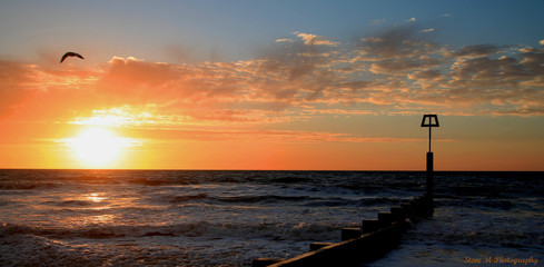 Ocean sunrise orange sky