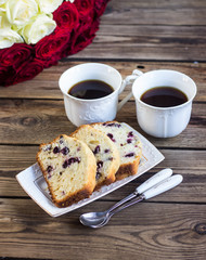 bouquet of red roses and coffee