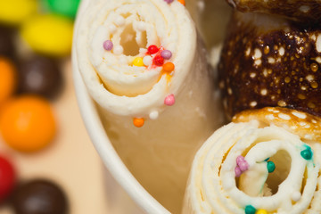 plombir, ice cream, ice roll, selective focus and small depth of field
