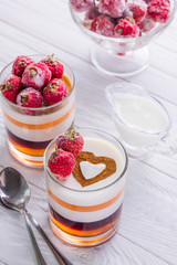 Layered jelly dessert with strawberries